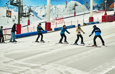 Group of Skiers on the Trainer Slope