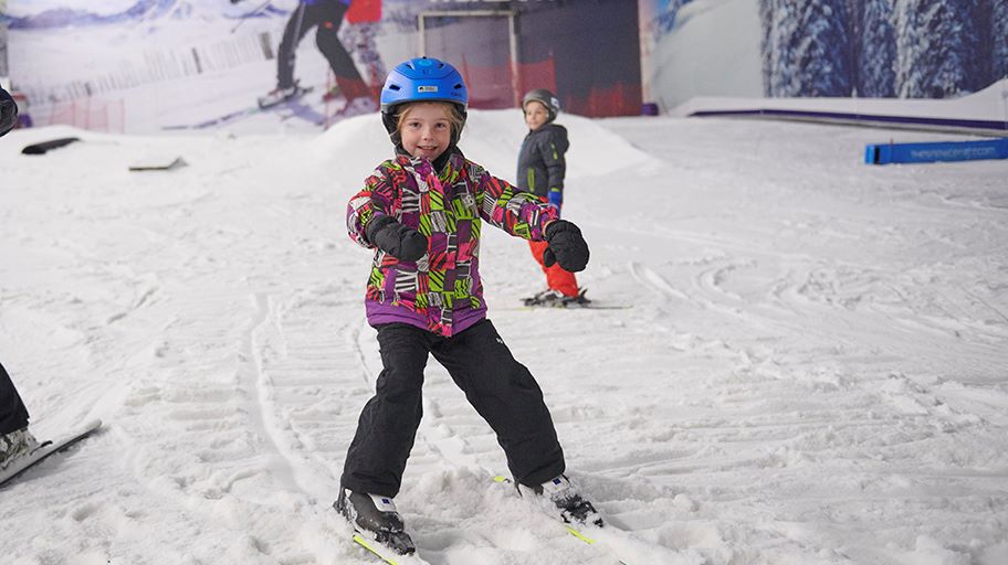 Girl Skiing on The Slopes at The Snow Centre